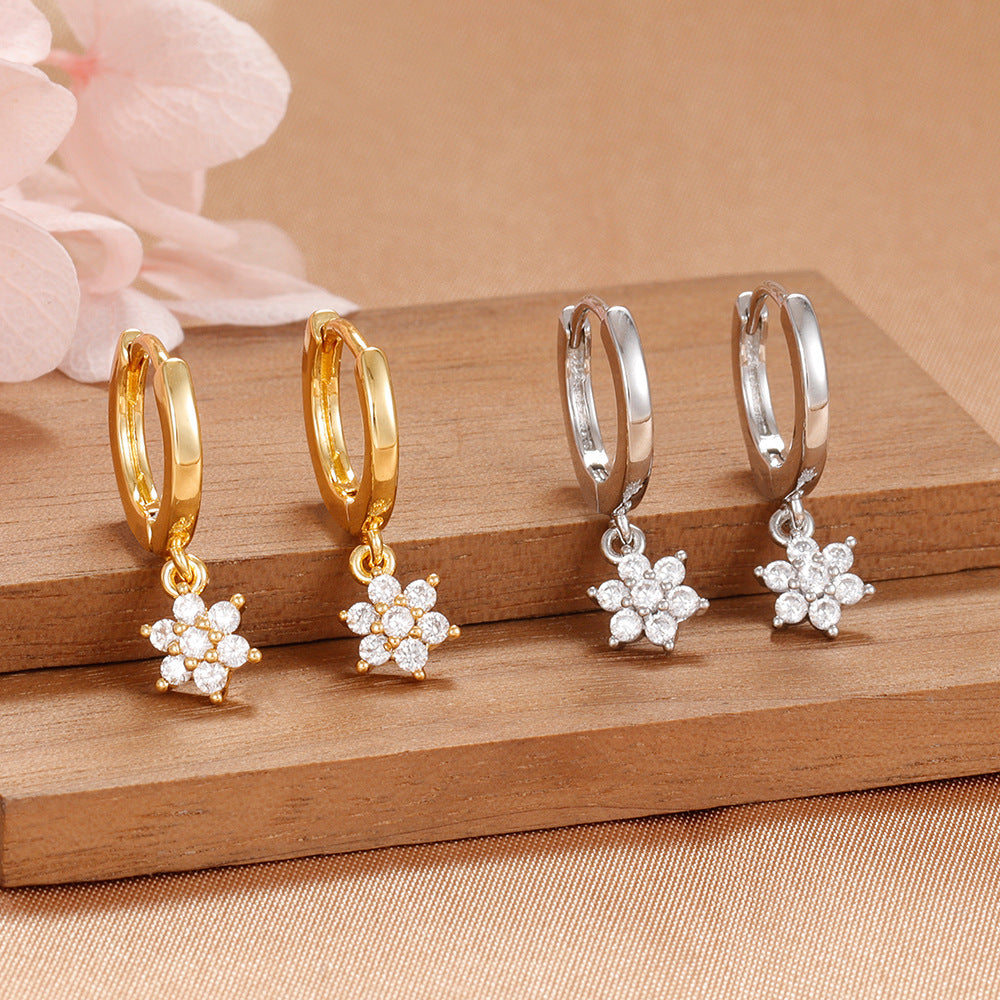 Boucles d’oreilles géométriques à fleurs