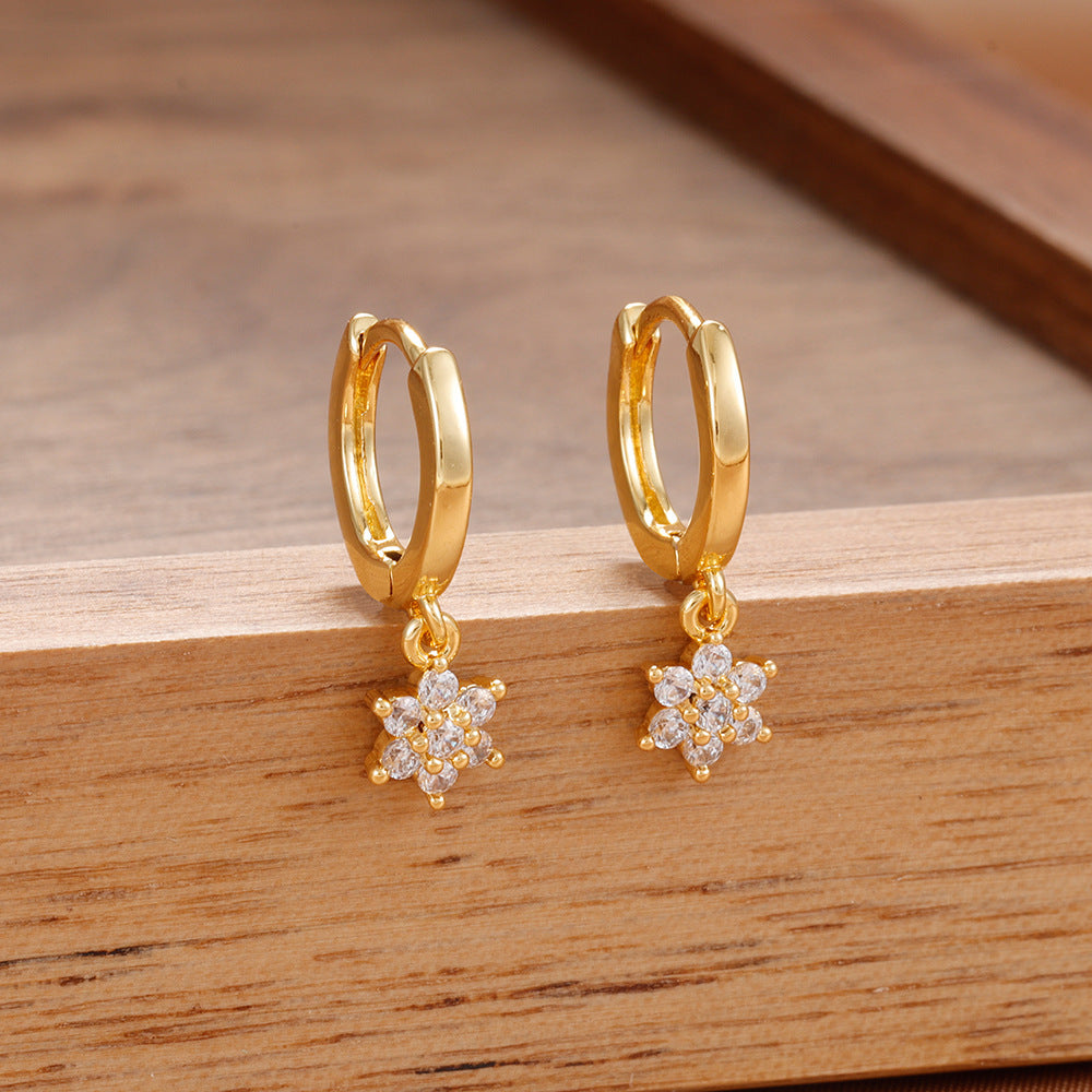 Boucles d’oreilles géométriques à fleurs